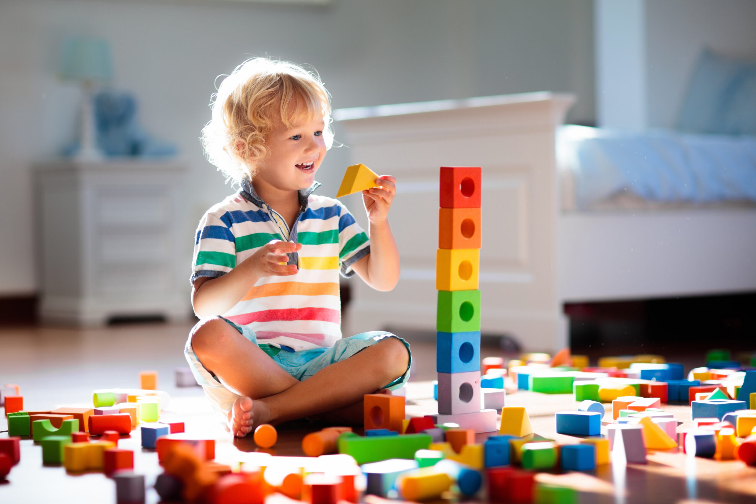 Child,Playing,With,Colorful,Toy,Blocks.,Kids,Play.,Little,Boy